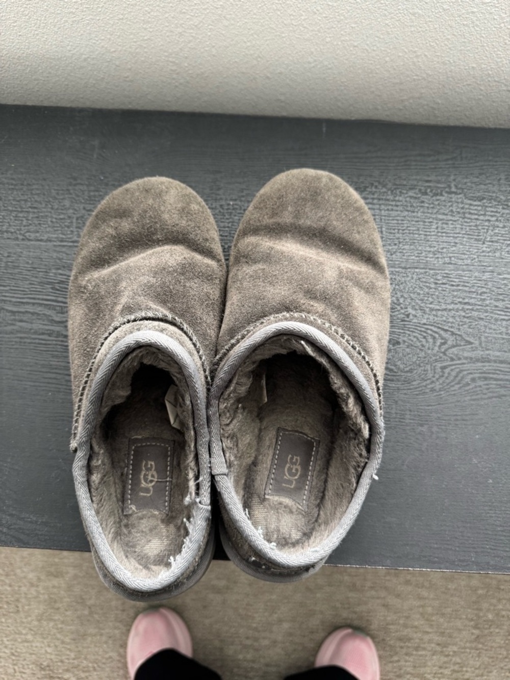 UGG women’s Grey slip on boots